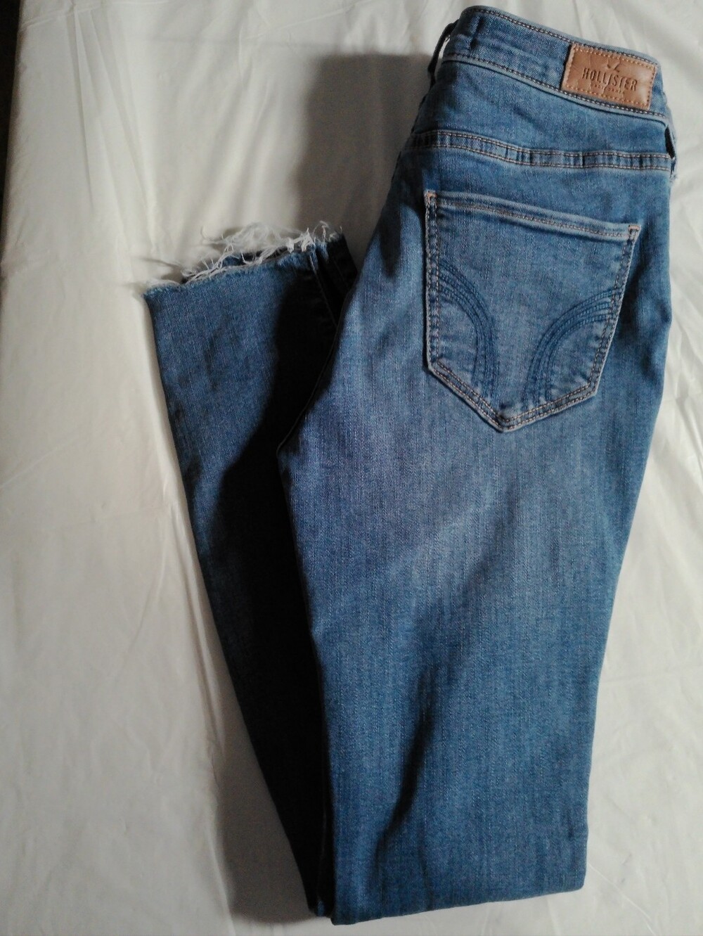 Hollister Women's Light Blue Frayed Hem Jeans